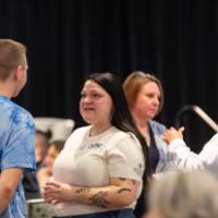 people standing and talking